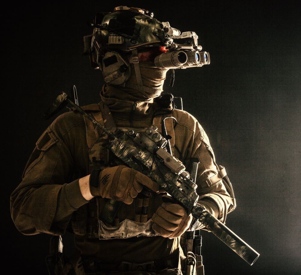 Soldier with Tactical Gear on Black Backdrop